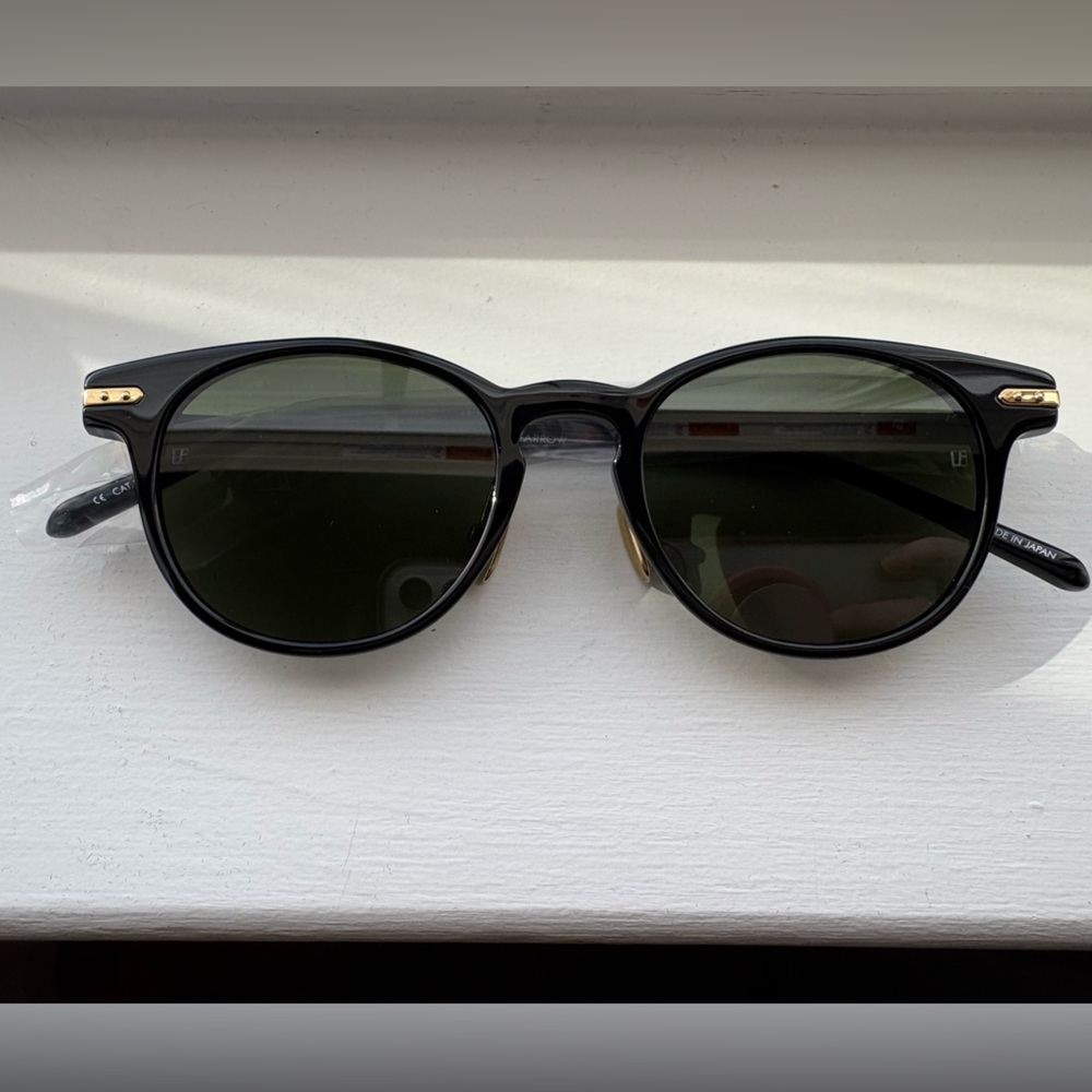 Linda Farrow Black and gold sunglasses